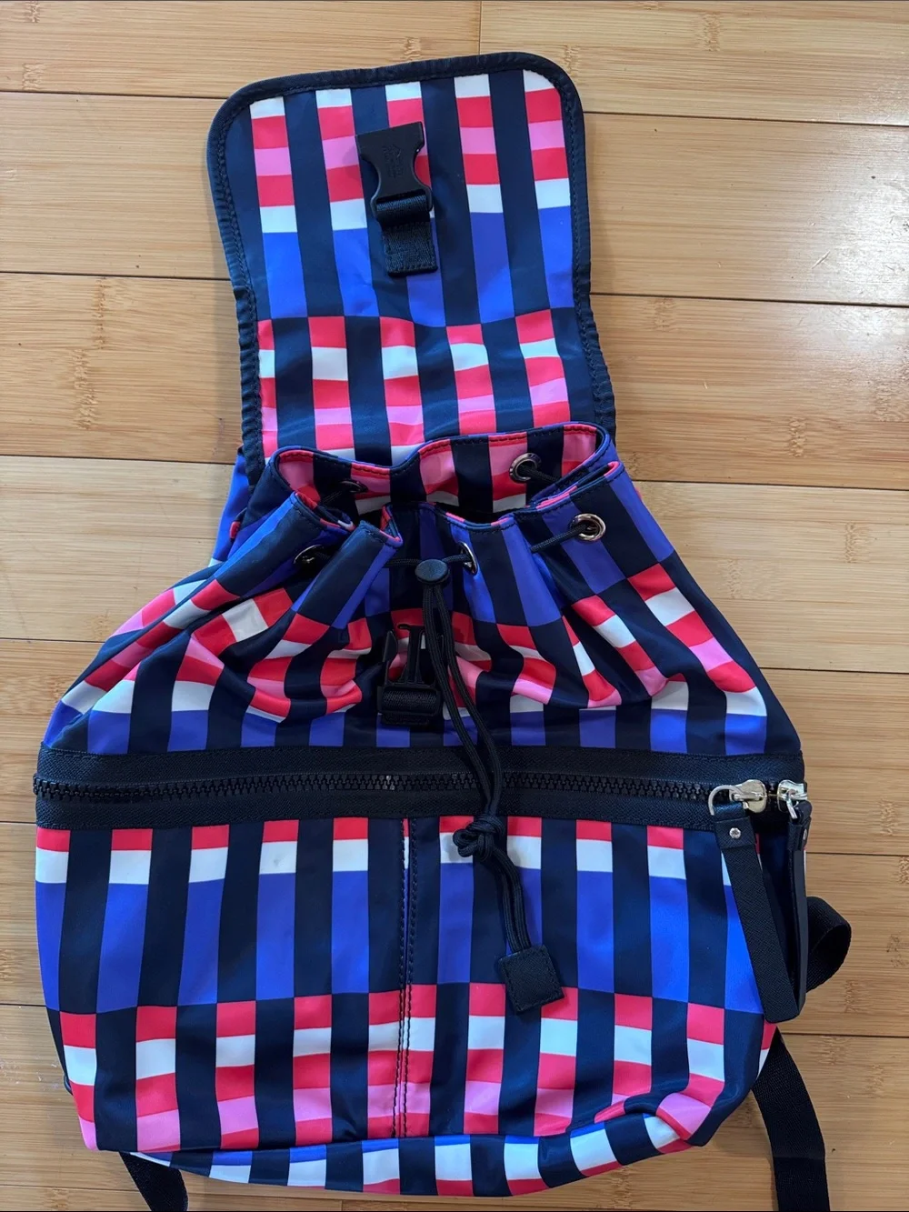 Kate Spade navy, royal blue, pink & red striped backpack